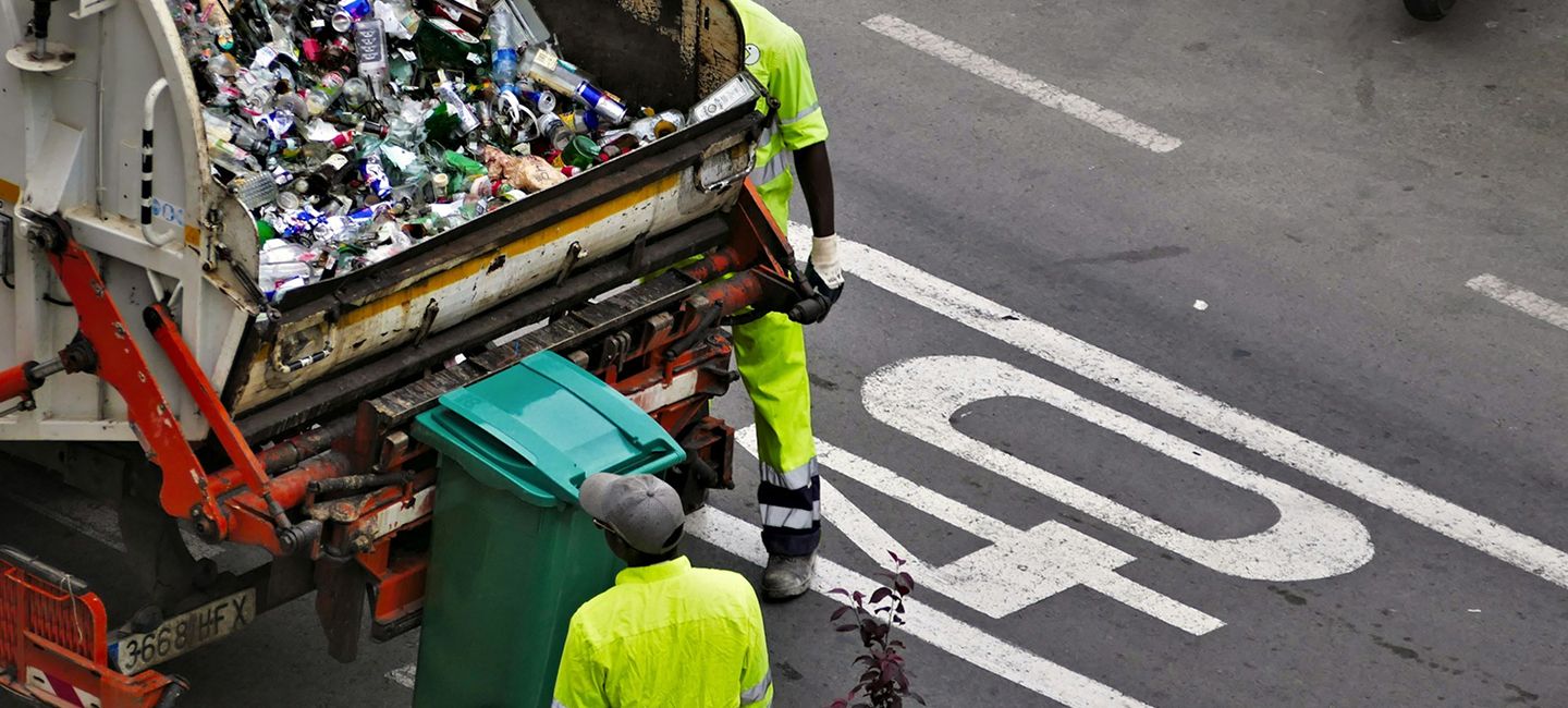 bin-being-emptied-into-a-lorry.jpg Bin being emptied into a bin lorry on the side of a road